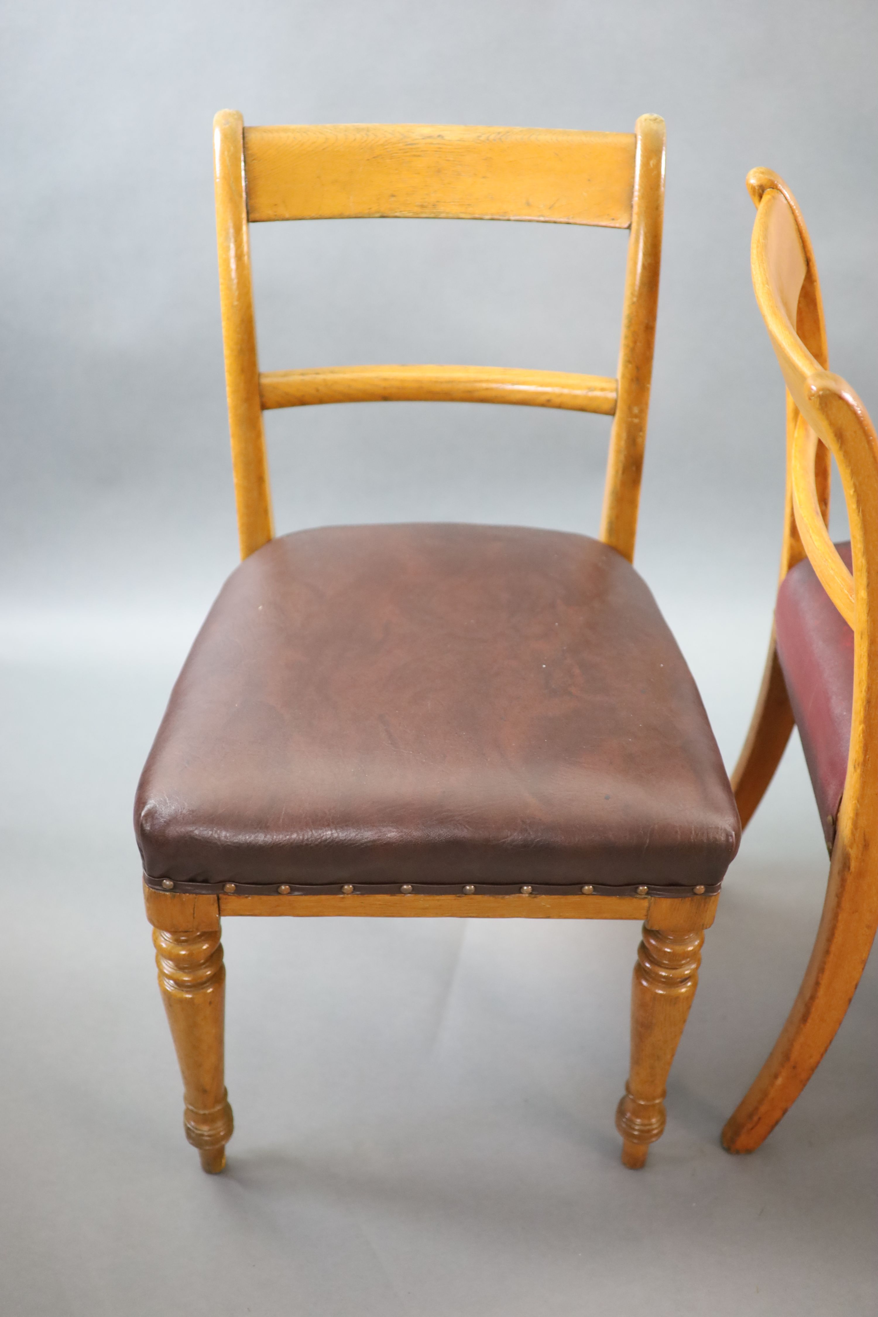 A set of eight early Victorian oak dining chairs